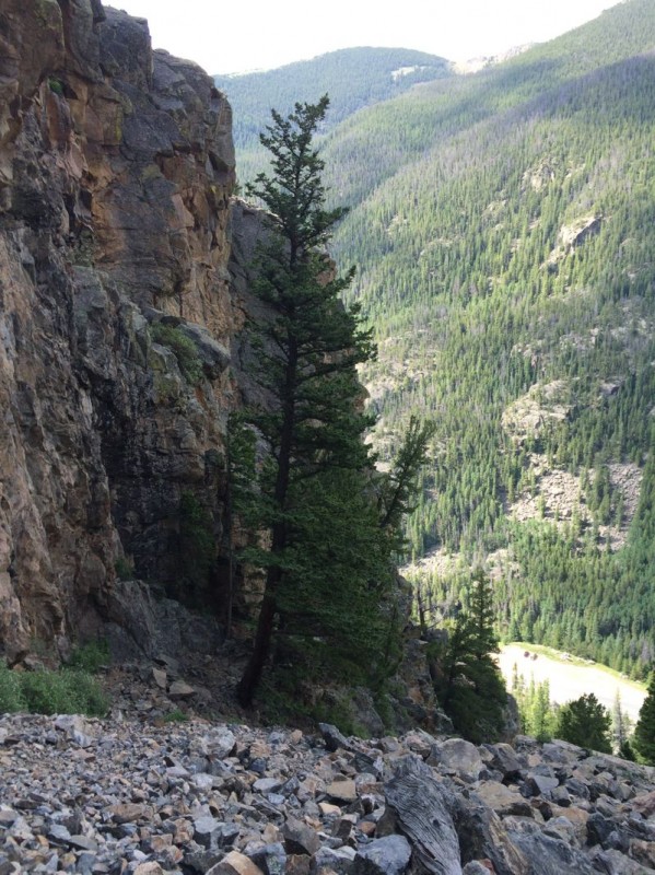 To get an idea of how far up we had to climb, take a look at our two cars parked in the lower right-hand corner of the picture... then imagine tumbling backwards down that rocky approach.