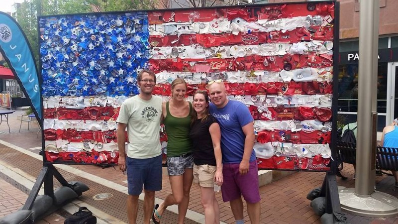 The four of us at the art fair. The flag was made entirely of trash, no doubt representing American consumerism.