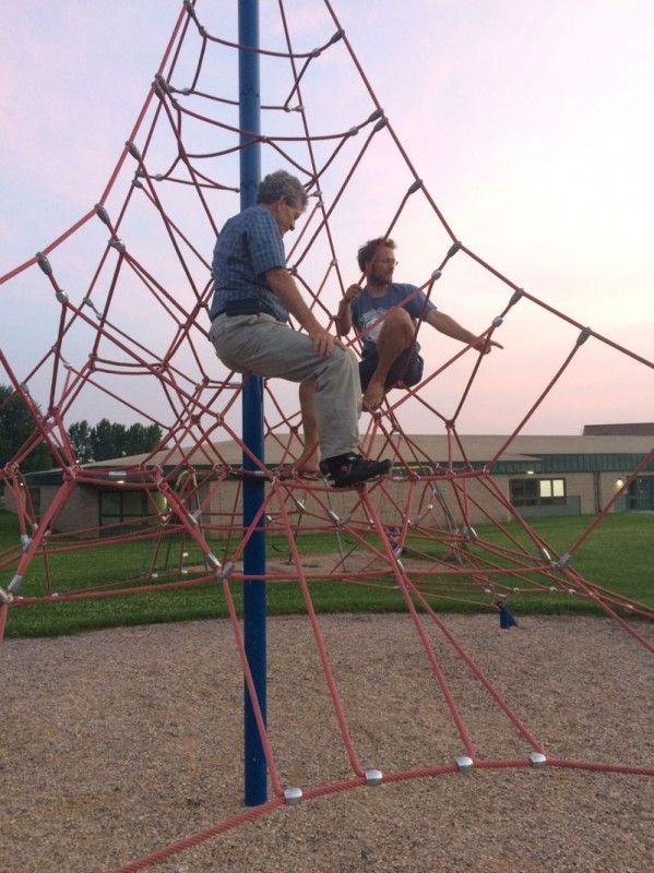 John and my dad hanging out on a play structure at my elementary school