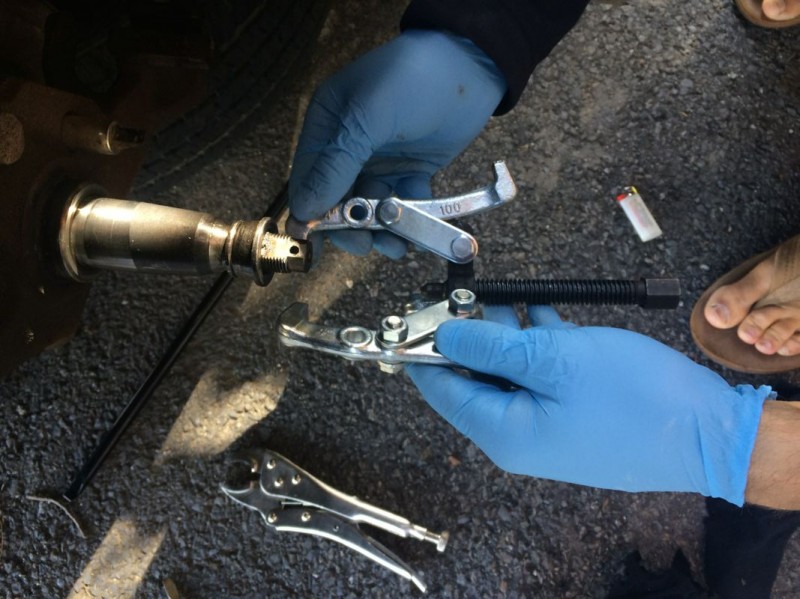 We had to use a pulley puller in order to get the old bearings off, since the distorted knuckle held them in place.