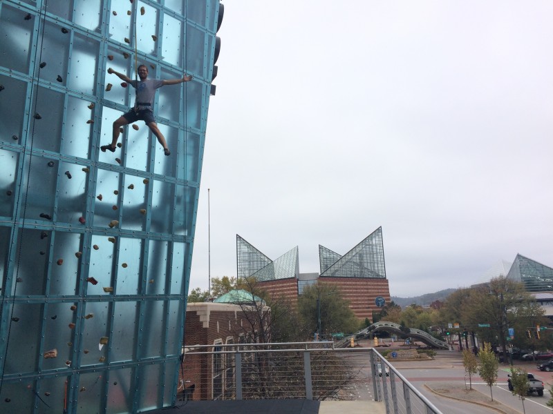 John climbing a route on the outside of the gym right near downtown Chattanooga.