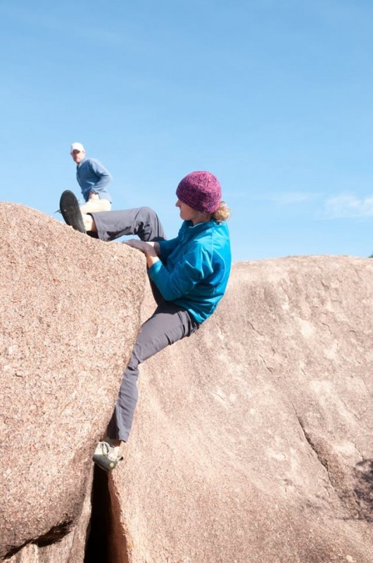 Awkwardly trying to finish a boulder problem after clearly throwing the wrong leg up. For the record, I made it.