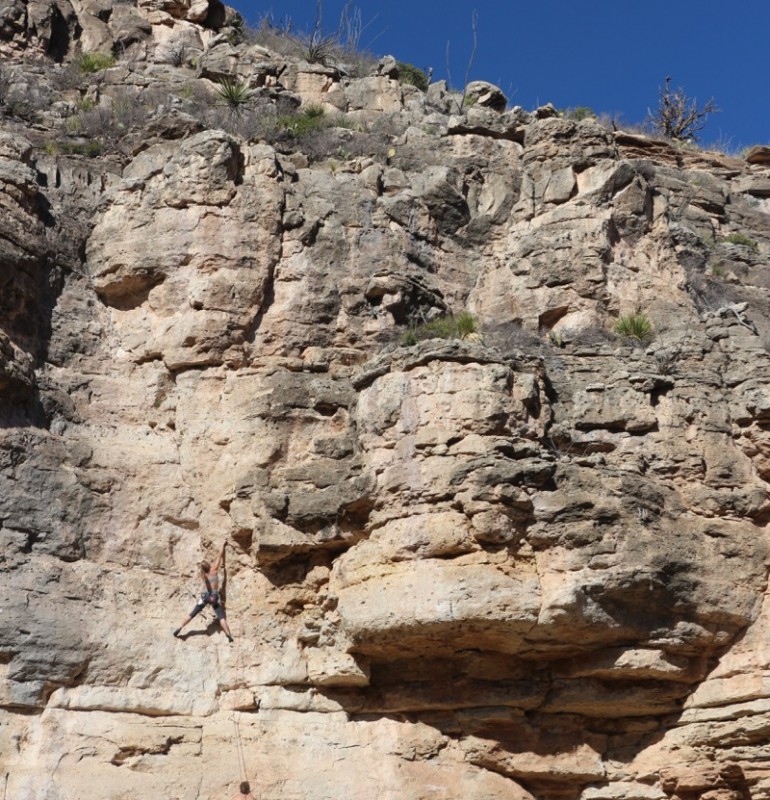 Me attempting to lead Fireball, a 10+ climb at Last Chance Canyon