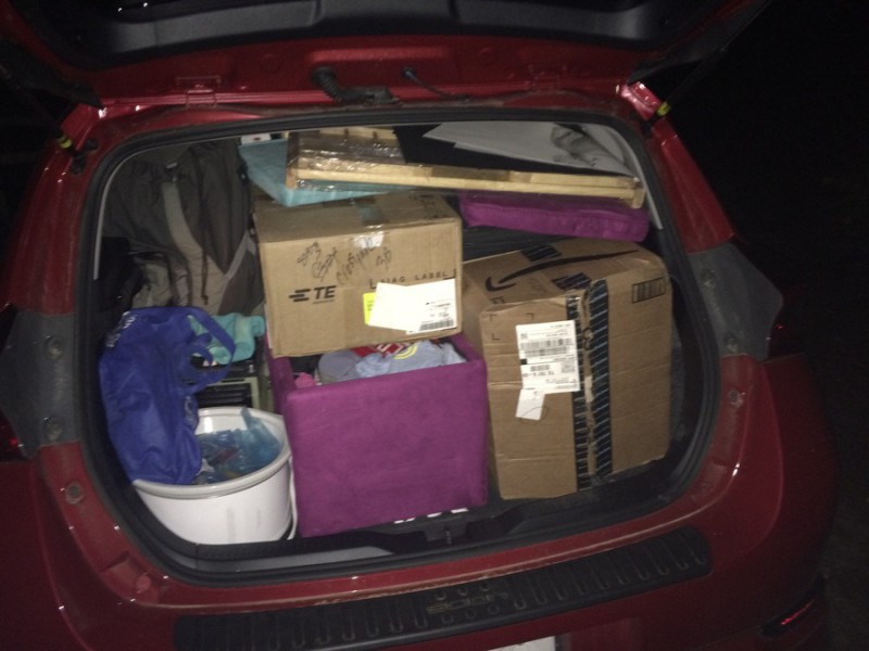 We loaded all our stuff into my tiny hatchback, leaving the van almost completely open for us to keep living in.
