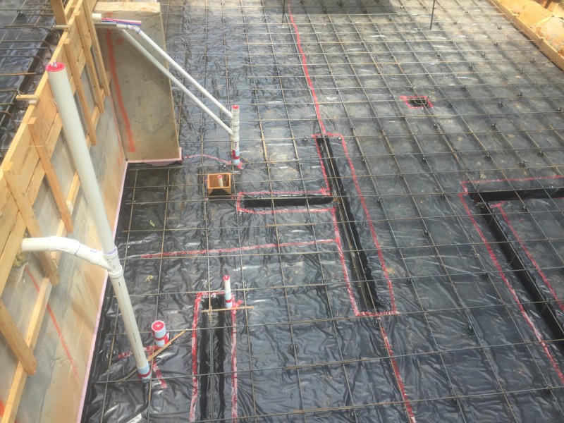 A closer look at the grade beam trenches and rebar grid