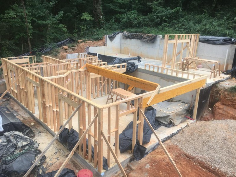 A view of the downstairs framing job... although I'm curious if John climbed a tree in order to get this photo.