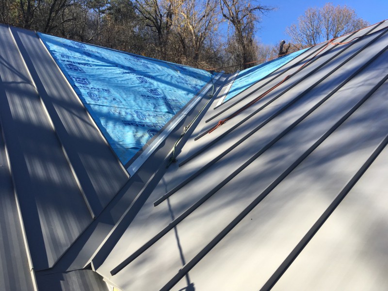 The panels on the main roof and the dormer, working their way up the valley where they meet