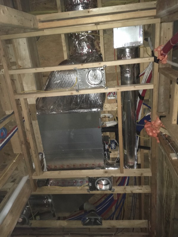 It's hard to show our A/C system through photographs, since everything is so spread out. This picture is a view of the ducting in the ceiling cavity of the first floor bathroom.