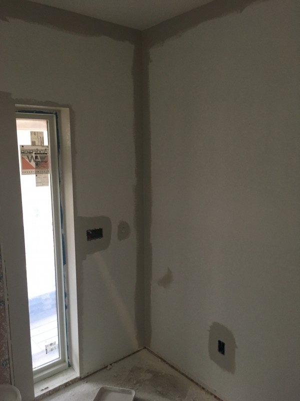 When painting on the white primed walls, the gray looked incredibly dark and had us a bit nervous...